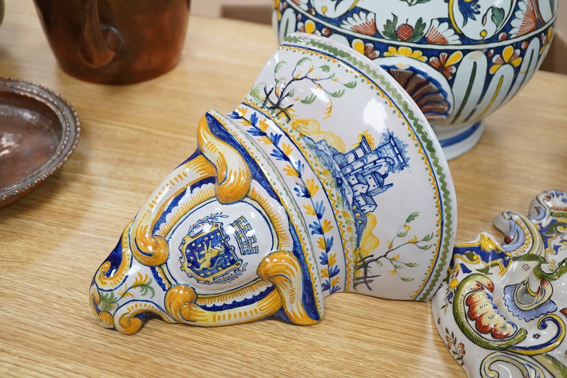 Two French faience large water wall cisterns, a wall pocket and wall bracket, largest 58cm high